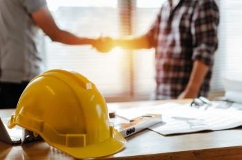 Professional handshake representing client partnership
